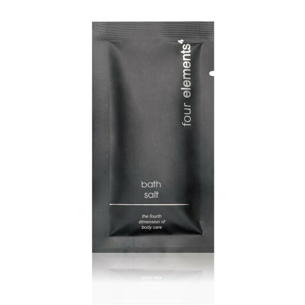 Hotel bath salt 10g in a black bag. A premium part of the Four Elements hotel toiletries brand, offering guests natural and indulgent hotel amenities.