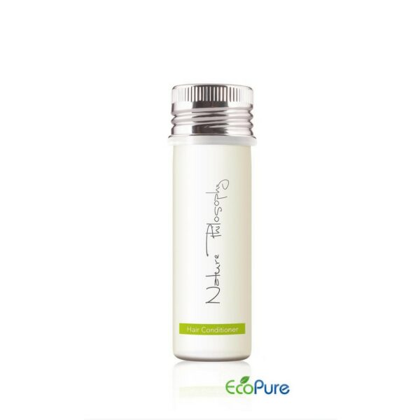 Hotel hair conditioner in a sleek white bottle 40ml with a silver cap, formulated with green tea, and Eco pure. A premium part of the Nature Philosophy hotel toiletries collection, natural and indulgent hotel amenities.