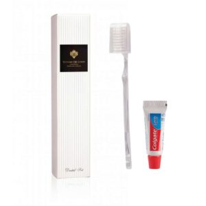 Vittore De Conti hotel dental set kit in a stylish box, contains a toothbrush and Colgate toothpaste. A luxury hotel cosmetic that complements the full range of guest toiletries and exclusive hotel amenities.