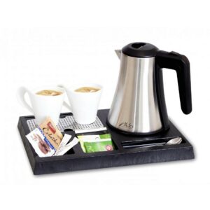 Electric kettle, inox, 0.8 liter, on a plastic elegant black tray. This hotel room appliance offers guest comfort, providing an inviting hot beverage experience as part of the room’s hotel amenities.