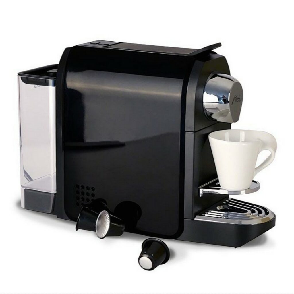 hotel coffee machine, Nespresso capsule machine, black coffee maker, compact hotel coffee maker, luxury hotel coffee, rapid heating coffee machine, stylish hotel appliance, easy-to-use coffee maker, premium hotel amenities, traveler coffee machine, high-quality brewing, hotel room coffee, coffee machine for hotels, sleek coffee maker, modern hotel appliance, guest room coffee machine, Nespresso compatible coffee maker, energy-efficient coffee machine, hotel room appliance, coffee maker for travelers, hotel room amenities, black hotel coffee machine, elegant coffee machine, instant coffee machine, hotel coffee solution