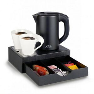 Electric kettle, black color, 0.8 liters on an elegant mini drawer black tray, complete with assorted tea bags and coffee sachets. This hotel room kettle tray set, appliance offers guest comfort, providing an inviting hot beverage experience as part of the room’s hotel amenities.