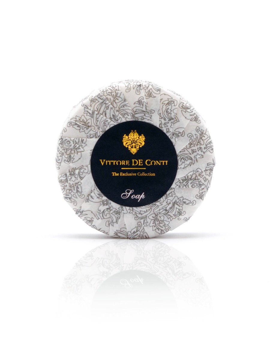 Vittore De Conti deluxe hotel soap wrapped in an elegant silver paper. A premium part of the VITTORE DE CONTI hotel toiletries exclusive collection, offering guests natural and indulgent hotel amenities.