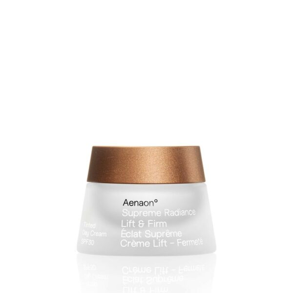 Aenaon Supreme Radiance Lift & Firm Day Face Cream SPF 30 in a 50ml frosted jar with a bronze cap, a luxurious organic skincare cosmetic designed to firm and hydrate. Made with natural ingredients, this tinted day cream offers premium protection and radiance, representing the best in natural skincare products.