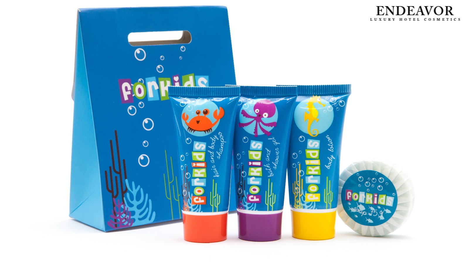 Luxury hotel toiletries set for kids featuring ocean themed packaging, including shampoo, body wash shower gel, body lotion, and soap. Perfect guest toiletries for family-friendly hotels.