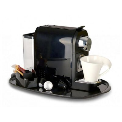 An elegant Nespresso Coffee Maker with a cup, aimed for guests comfort in hotel room. A luxury hotel room amenity